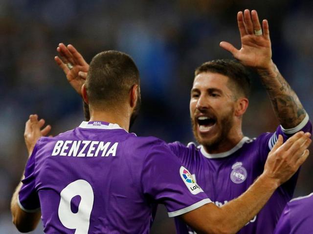 Real Madrid's Karim Benzema and Sergio Ramos celebrate a goal. (REUTERS) Real Madrid's Karim Benzema and Sergio Ramos celebrate a goal. (REUTERS)