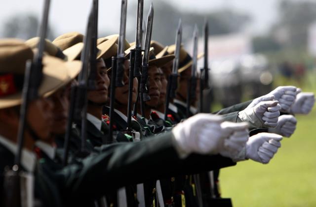 Nepalese soldiers march during a ceremony held at the Army Parade Ground in Kathmandu on Monday to mark the first anniversary of the new Constitution. (AFP) Nepalese soldiers march during a ceremony held at the Army Parade Ground in Kathmandu on Monday to mark the first anniversary of the new Constitution. (AFP)