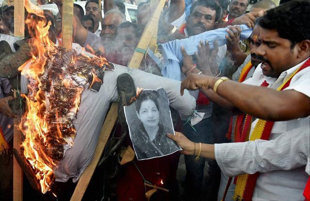 Kannada activists in Bengaluru burn an effigy of Tamil Nadu Chief Minister Jayalalithaa to protest against the Supreme Court’s order to release Cauvery water for Tamil Nadu. (PTI) Kannada activists in Bengaluru burn an effigy of Tamil Nadu Chief Minister Jayalalithaa to protest against the Supreme Court’s order to release Cauvery water for Tamil Nadu. (PTI)