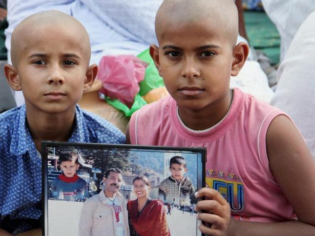 Sons of Havildar Ravi Paul - Vansh Salotra (R) and Sudansheesh (L) - at their native village, Sarwa in Samba . (PTI) Sons of Havildar Ravi Paul - Vansh Salotra (R) and Sudansheesh (L) - at their native village, Sarwa in Samba . (PTI)