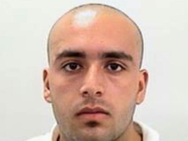 A still image captured from a video from WABC television shows a conscious man believed to be New York bombing suspect Ahmad Khan Rahami being loaded into an ambulance after a shoot-out with police in Linden. (REUTERS) A still image captured from a video from WABC television shows a conscious man believed to be New York bombing suspect Ahmad Khan Rahami being loaded into an ambulance after a shoot-out with police in Linden. (REUTERS)