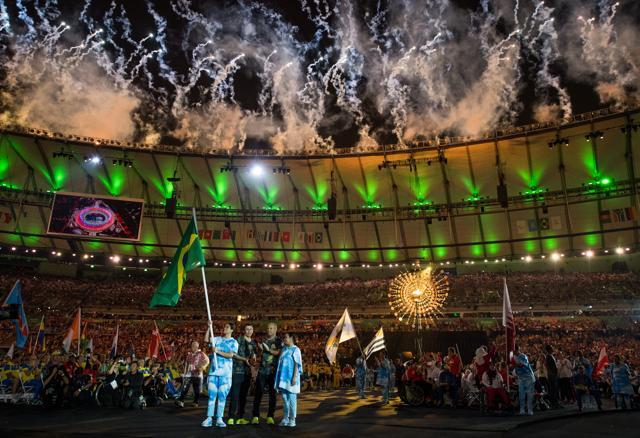 In this photo released by the IOC, football 5-a-side player Ricardinho of Brazil carries in his country’s flag. (AP Photo) In this photo released by the IOC, football 5-a-side player Ricardinho of Brazil carries in his country’s flag. (AP Photo)