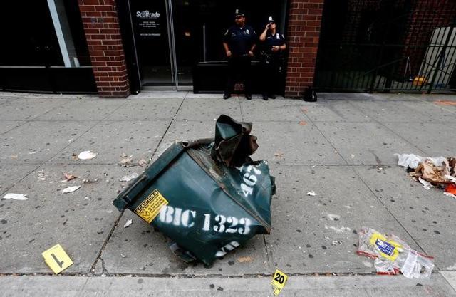 A view of a mangled dumpster at the site of an explosion that occurred on Saturday night in New York. (Reuters Photo) A view of a mangled dumpster at the site of an explosion that occurred on Saturday night in New York. (Reuters Photo)