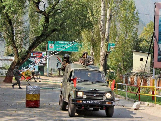 Army officers move inside the Uri Army Brigade Camp.(PTI Photo)