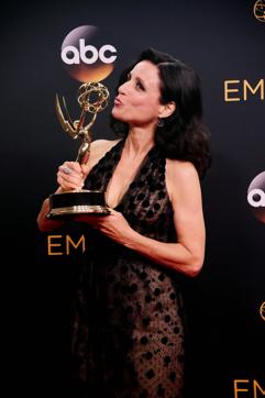 Julia Louis-Dreyfus poses in the press room with the Emmy for Outstanding Lead Actress in a Comedy Series for "Veep" during the 68th Emmy Awards on September 18, 2016 at the Microsoft Theatre in downtown Los Angeles. / AFP PHOTO / FREDERIC J BROWN (AFP)