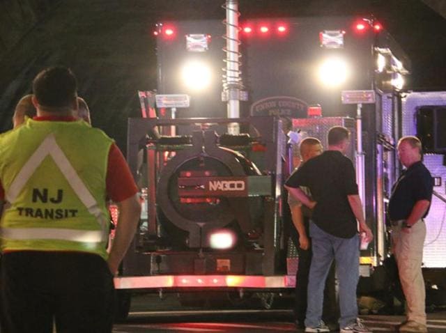Bomb squad personnel stand around the scene of an explosion near the train station in Elizabeth, New Jersey. (AP Photo) Bomb squad personnel stand around the scene of an explosion near the train station in Elizabeth, New Jersey. (AP Photo)