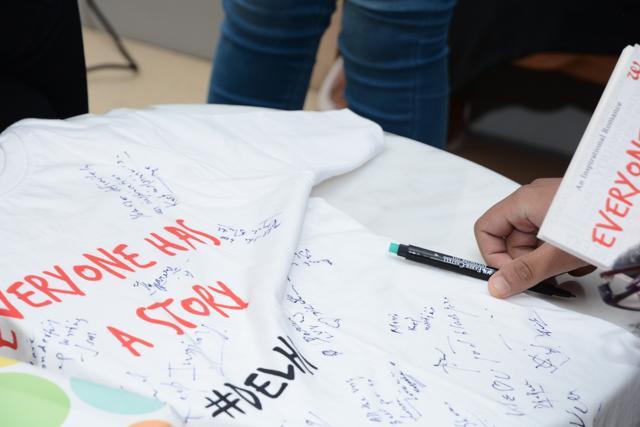 Readers scribbled messages and signed a T-shirt as part of the event.