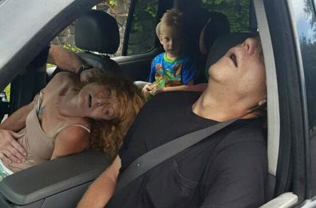 In this Wednesday, September 7, 2016, file photo, released by the East Liverpool Police Department, a young child sits in a vehicle behind his grandmother, Rhonda Pasek and her boyfriend, James Acord, both of whom are unconscious from a drug overdose, in East Liverpool, Ohio. An Ohio judge has turned over the custody of the boy. A Columbiana County Juvenile Court administrator told The Associated Press that the boy’s great uncle and great aunt petitioned the court for custody, which was granted by a judge on Monday, September 12. (AP) In this Wednesday, September 7, 2016, file photo, released by the East Liverpool Police Department, a young child sits in a vehicle behind his grandmother, Rhonda Pasek and her boyfriend, James Acord, both of whom are unconscious from a drug overdose, in East Liverpool, Ohio. An Ohio judge has turned over the custody of the boy. A Columbiana County Juvenile Court administrator told The Associated Press that the boy’s great uncle and great aunt petitioned the court for custody, which was granted by a judge on Monday, September 12. (AP)