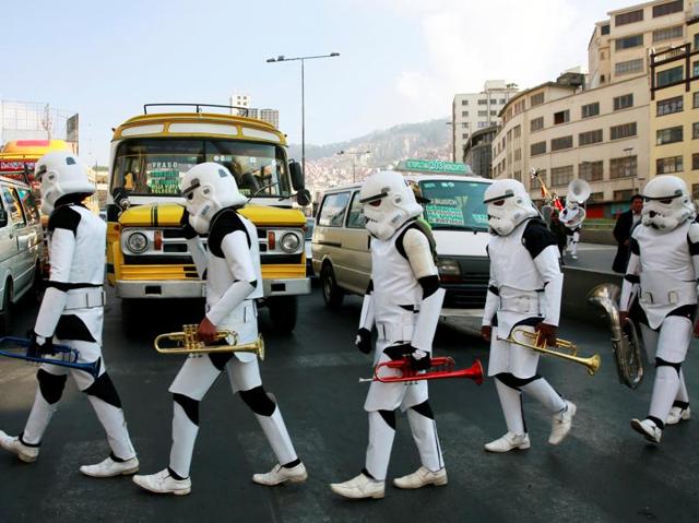 Members of a school band wearing Star Wars costumes walk in the centre of La Paz, Bolivia. (REUTERS)