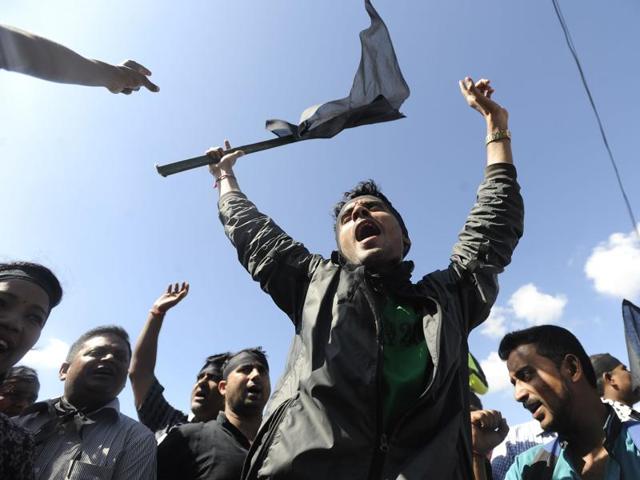 Nepalese activists from the Federal Alliance (members of the Madhesi and ethnic communities) chant anti-constitution slogans on the first anniversary of Nepal's new constitution in Kathmandu on Monday (AFP) Nepalese activists from the Federal Alliance (members of the Madhesi and ethnic communities) chant anti-constitution slogans on the first anniversary of Nepal's new constitution in Kathmandu on Monday (AFP)