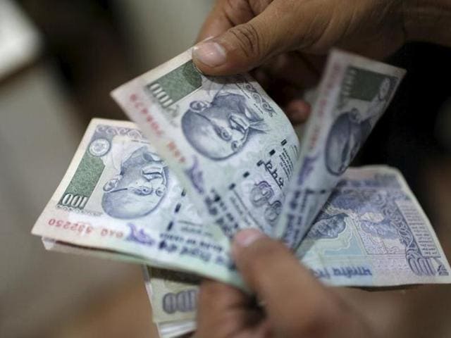 The Indian rupee is set to remain volatile for a few months, primarily due to external factors such as the monetary policy reviews by the US and Japan.(REUTERS)