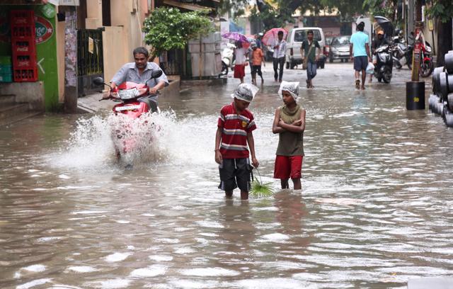 Hyderabad: Heavy rain triggers traffic jams, roads cave in, localities ...