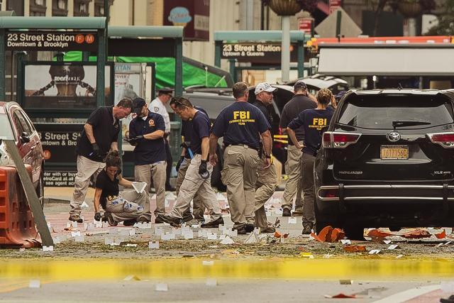 Members of the FBI investigate at the scene of Saturday's explosion on West 23rd Street and Sixth Avenue in Manhattan, New York. (AP File Photo) Members of the FBI investigate at the scene of Saturday's explosion on West 23rd Street and Sixth Avenue in Manhattan, New York. (AP File Photo)