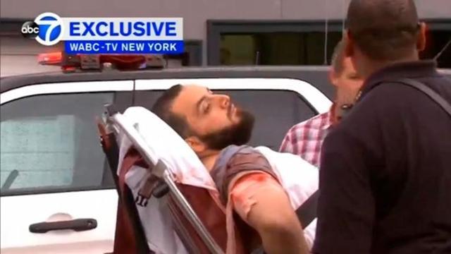 A still image captured from a video from WABC television shows a conscious man believed to be New York bombing suspect Ahmad Khan Rahami being loaded into an ambulance after a shootout. (Reuters Photo) A still image captured from a video from WABC television shows a conscious man believed to be New York bombing suspect Ahmad Khan Rahami being loaded into an ambulance after a shootout. (Reuters Photo)