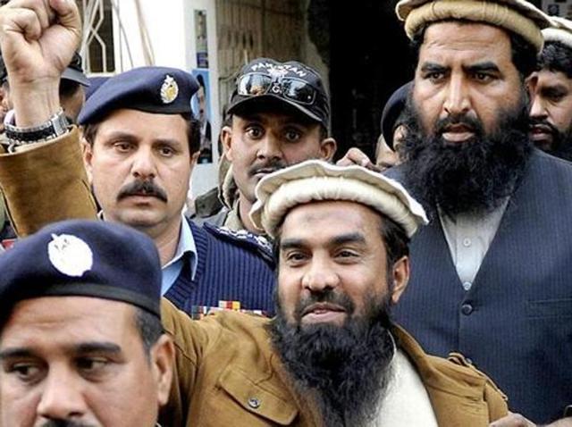 Zaki-ur-Rahman Lakhvi, the suspected mastermind of the Mumbai terror attacks in 2008, raises his fist after his court appearance in Islamabad, Pakistan. (AP File Photo) Zaki-ur-Rahman Lakhvi, the suspected mastermind of the Mumbai terror attacks in 2008, raises his fist after his court appearance in Islamabad, Pakistan. (AP File Photo)