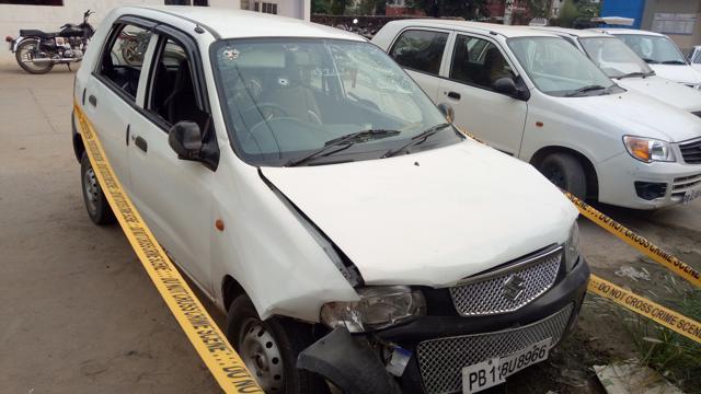 The bullet-ridden windshield of the car. (HT Photo)
