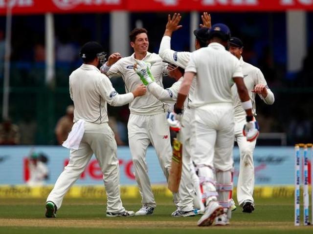 New Zealand's Mitchell Santner (C) celebrates the wicket of India's Lokesh Rahul. (AFP Photo) New Zealand's Mitchell Santner (C) celebrates the wicket of India's Lokesh Rahul. (AFP Photo)
