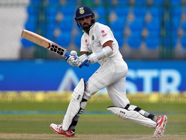 India's Murali Vijay (R) plays a shot as New Zealand wicket keeper BJ Watling (L) looks on. (AFP Photo) India's Murali Vijay (R) plays a shot as New Zealand wicket keeper BJ Watling (L) looks on. (AFP Photo)