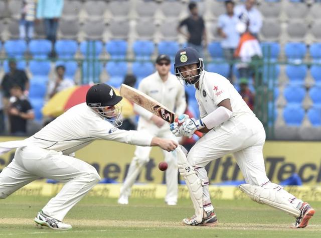 Cheteshwar Pujara bats during 1st day of 1st Test match between India and New Zealand.(Ajay Aggarwal/HT PHOTO)