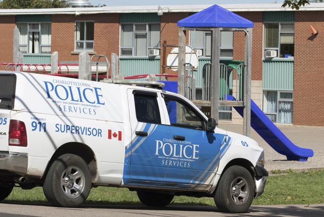 A Charlottetown Police vehicle drives into Sherwood Elementary School, which was one of the schools which Canadian police evacuated due to a bomb threat, in Charlottetown, Prince Edward Island, Canada. (REUTERS) A Charlottetown Police vehicle drives into Sherwood Elementary School, which was one of the schools which Canadian police evacuated due to a bomb threat, in Charlottetown, Prince Edward Island, Canada. (REUTERS)