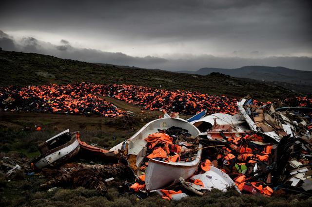 This February 19, 2016 file photo shows wrecked boats and thousands of life jackets used by refugees and migrants during their journey across the Aegean sea lie in a dump in Mithimna. (AFP file photo) This February 19, 2016 file photo shows wrecked boats and thousands of life jackets used by refugees and migrants during their journey across the Aegean sea lie in a dump in Mithimna. (AFP file photo)