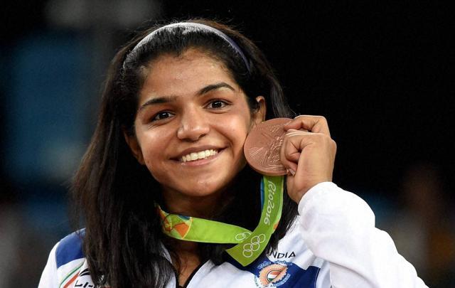 India's Sakshi Malik poses with her bronze medal for the women's wrestling freestyle 58kg competition. (PTI) India's Sakshi Malik poses with her bronze medal for the women's wrestling freestyle 58kg competition. (PTI)