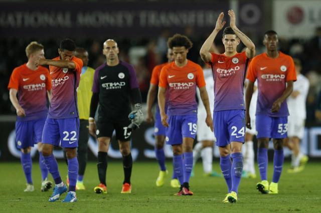 Manchester City's John Stones applauds fans after the game. (Reuters)