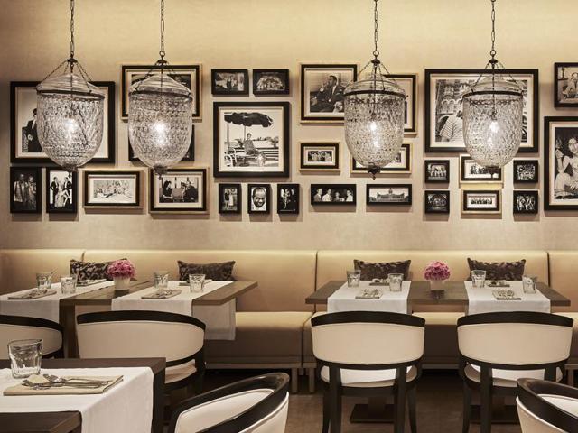 On a far wall are black-and-white photos of models (Cindy Crawford) and musicians (Louis Armstrong) who graced this space. On a far wall are black-and-white photos of models (Cindy Crawford) and musicians (Louis Armstrong) who graced this space.