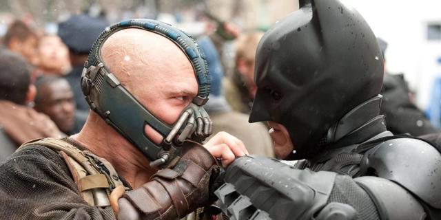 Tom Hardy as Bane and Christian Bale and Batman in The Dark Knight Rises. Tom Hardy as Bane and Christian Bale and Batman in The Dark Knight Rises.