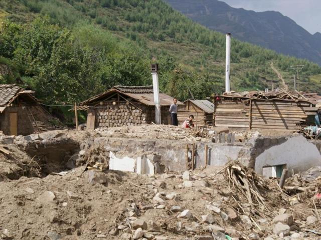This handout photo by Unicef DPRK shows heavily damaged homes due to heavy flooding of the Tumen river in Haksan Ri, North Korea.(AFP Photo) This handout photo by Unicef DPRK shows heavily damaged homes due to heavy flooding of the Tumen river in Haksan Ri, North Korea.(AFP Photo)