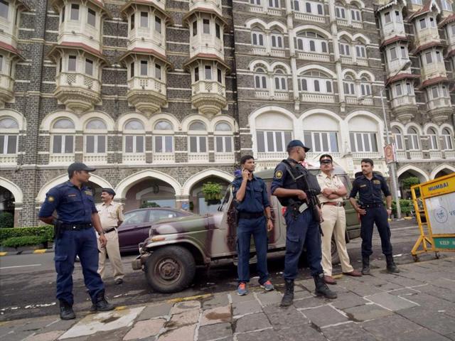 Mumbai police commandos guard the coast along Gateway of India after a high alert was sounded. (PTI) Mumbai police commandos guard the coast along Gateway of India after a high alert was sounded. (PTI)