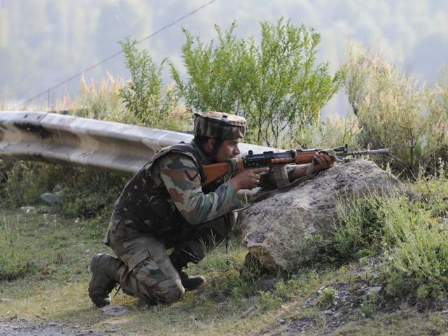 A soldier near the army base which was attacked in Uri on Sunday. Islamabad has denied any role in the attack that left 18 soldiers dead. (Waseem Andrabi/HT) A soldier near the army base which was attacked in Uri on Sunday. Islamabad has denied any role in the attack that left 18 soldiers dead. (Waseem Andrabi/HT)