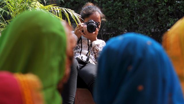 A photographer captures the mood during the talent hunt at Modi College in Patiala on Friday. (Bharat Bhushan/HT Photo)
