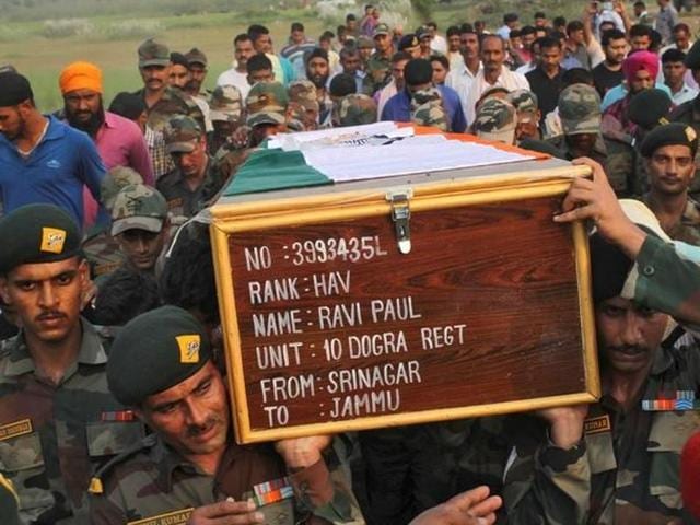 School students pay their tribute to the army soldiers who killed in the Uri terror attack, in Thane, Mumbai. (PTI Photo) School students pay their tribute to the army soldiers who killed in the Uri terror attack, in Thane, Mumbai. (PTI Photo)