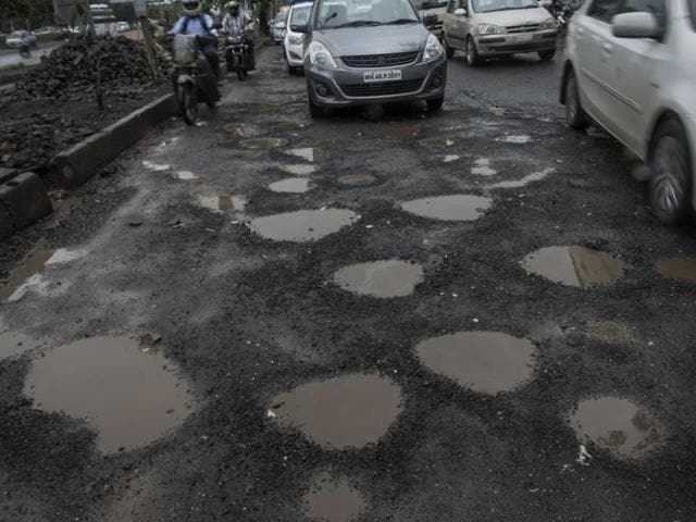 The BMC engineer has been removed by the minister for poor maintenance of roads in the city. (Pic for representation purpose) The BMC engineer has been removed by the minister for poor maintenance of roads in the city. (Pic for representation purpose)