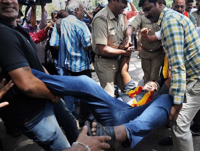 Police arrest Kannada activists who were trying to enter the railway station to stop trains during their protest over Cauvery water issue, in Bengaluru. (PTI Photo) Police arrest Kannada activists who were trying to enter the railway station to stop trains during their protest over Cauvery water issue, in Bengaluru. (PTI Photo)