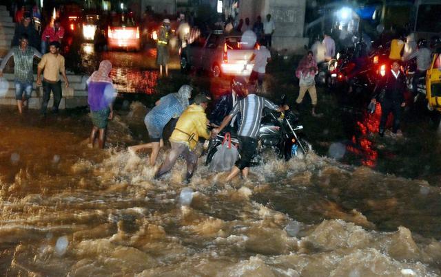 Streets flooded after heavy rain near Mahboob Mansion Market Malakpet in Hyderabad. (PTI) Streets flooded after heavy rain near Mahboob Mansion Market Malakpet in Hyderabad. (PTI)