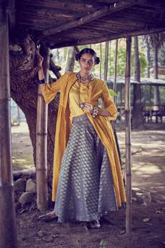 For the day, pick a gilded Banarsi handloom skirt with a solid-coloured top. Amp it up with a bright kedia before you step out to dance the night away. (Amoh by Jade ) For the day, pick a gilded Banarsi handloom skirt with a solid-coloured top. Amp it up with a bright kedia before you step out to dance the night away. (Amoh by Jade )