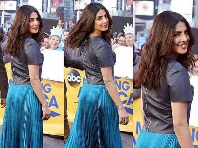 When she stopped by Good Morning America, we immediately zoomed in on her zip-back top and teal skirt. The unexpectedly trendy combo simply hadn’t crossed our minds.(Instagram)