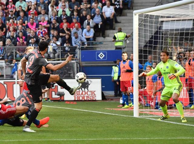 Bayern's Joshua Kimmich, second from right, celebrates with teammates after scoring the first goal. (AP Photo) Bayern's Joshua Kimmich, second from right, celebrates with teammates after scoring the first goal. (AP Photo)