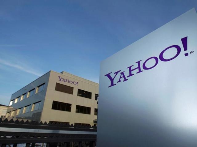 A Yahoo logo is pictured in front of a building in Rolle, 30 km (19 miles) east of Geneva, December 12, 2012. REUTERS/Denis Balibouse/File photo A Yahoo logo is pictured in front of a building in Rolle, 30 km (19 miles) east of Geneva, December 12, 2012. REUTERS/Denis Balibouse/File photo