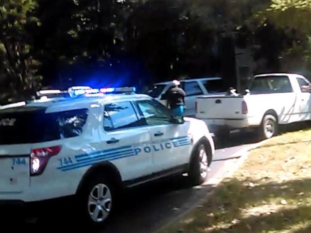 The video taken by Rakeyia Scott, shows moments after the shooting of Keith Lamont Scott in Charlotte, North Carolina. The wife of the African American man, whose death has triggered days of unrest, on Friday released dramatic video footage of the moments before and after he was shot by police. (AFP) The video taken by Rakeyia Scott, shows moments after the shooting of Keith Lamont Scott in Charlotte, North Carolina. The wife of the African American man, whose death has triggered days of unrest, on Friday released dramatic video footage of the moments before and after he was shot by police. (AFP)