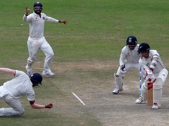 India's Rohit Sharma takes the catch of New Zealand's Trent Boult. (REUTERS)