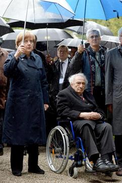 German Chancellor Angela Merkel (left) and Holocaust survivor Max Mannheimer attend a ceremony marking the 70th anniversary of the Dachau concentration camp in Dachau, southern Germany. (AP File Photo) German Chancellor Angela Merkel (left) and Holocaust survivor Max Mannheimer attend a ceremony marking the 70th anniversary of the Dachau concentration camp in Dachau, southern Germany. (AP File Photo)