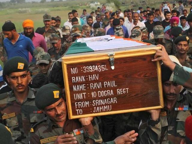Indian army soldiers carry a coffin containing the body of their fallen colleague Ravi Paul, who was killed in Sunday's attack in Kashmir's Uri. Pakistan has cancelled the event in light of rising tensions.(Reuters)