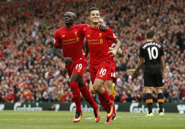 Liverpool's Philippe Coutinho celebrates scoring their fourth goal with Sadio Mane. (REUTERS) Liverpool's Philippe Coutinho celebrates scoring their fourth goal with Sadio Mane. (REUTERS)