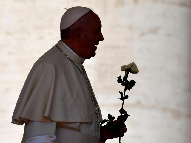 Pope Francis holds a rose in St Peter's square at the Vatican on September 3, 2016 upon his arrival for a catechism with nuns of the Missionary of Charity, the Religious family founded by Mother Teresa. (AFP file photo) Pope Francis holds a rose in St Peter's square at the Vatican on September 3, 2016 upon his arrival for a catechism with nuns of the Missionary of Charity, the Religious family founded by Mother Teresa. (AFP file photo)