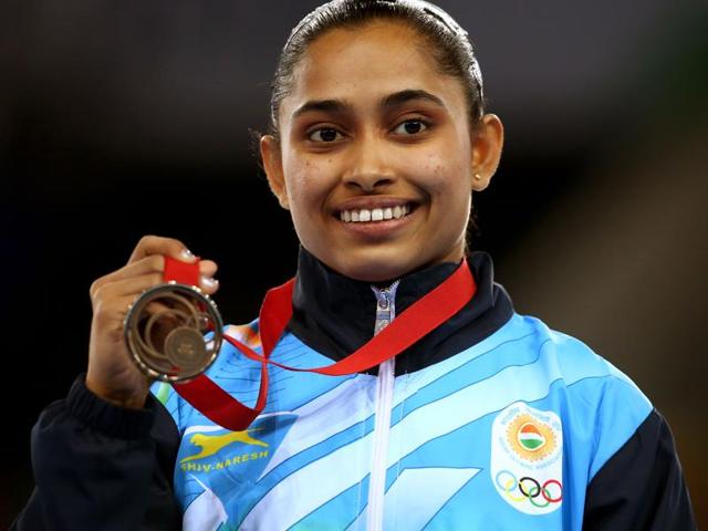 Dipa Karmakar with her coach Bishweshwar Nandi in Kolkata.(Subhankar Chakraborty/HT Photo)