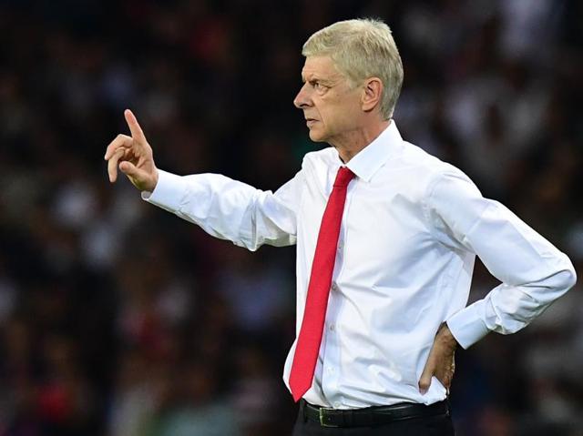 Wenger gestures during the Uefa Champions League Group A football match between Paris-Saint-Germain and Arsenal FC, on September 13, 2016 at the Parc des Princes stadium in Paris. (AFP File Photo)