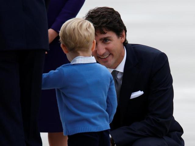 But hey! Let’s not forget that the world’s best looking Prime Minister, Justin Trudeau was also there. He tries to chat with Prince George here. (REUTERS) But hey! Let’s not forget that the world’s best looking Prime Minister, Justin Trudeau was also there. He tries to chat with Prince George here. (REUTERS)